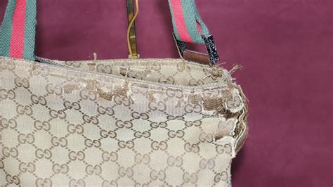 damaged gucci bag